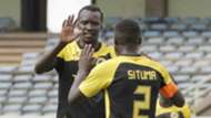 Tusker midfielder Humphrey Mieno celebrates with James Situma