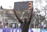 A fourth official displays board time during Nakuru All Stars v KCB tie