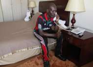 Harambee Stars team manager Willis Waliaula makes frantic efforts to secure his release after being detained for unpaid bills in Ethiopia