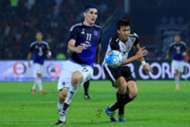 Johor Darul Ta'zim's Jorge Pereyra Diaz (left) in his team's match against T-Team 24/9/2016