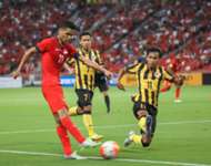 Malaysia's Baddrol Bakhtiar slides in to block Singapore's Safuwan Baharudin