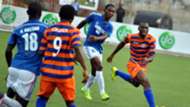 Odunlami shields the ball away from an opponent
