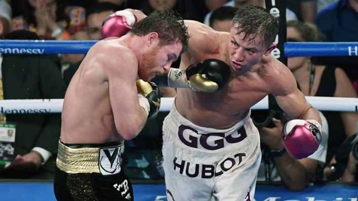 Gennardy Golovkin (right) throws a right hand at Saul 'Canelo' Alvarez