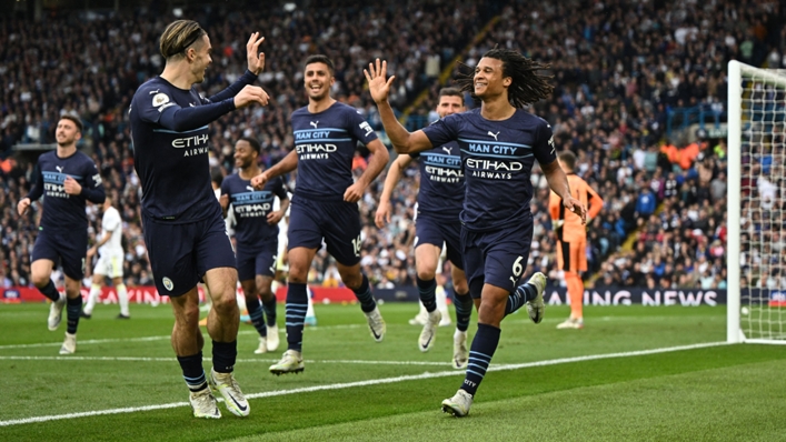 Manchester City beat Leeds United 4-0 to retain a one-point lead at the top of the Premier League