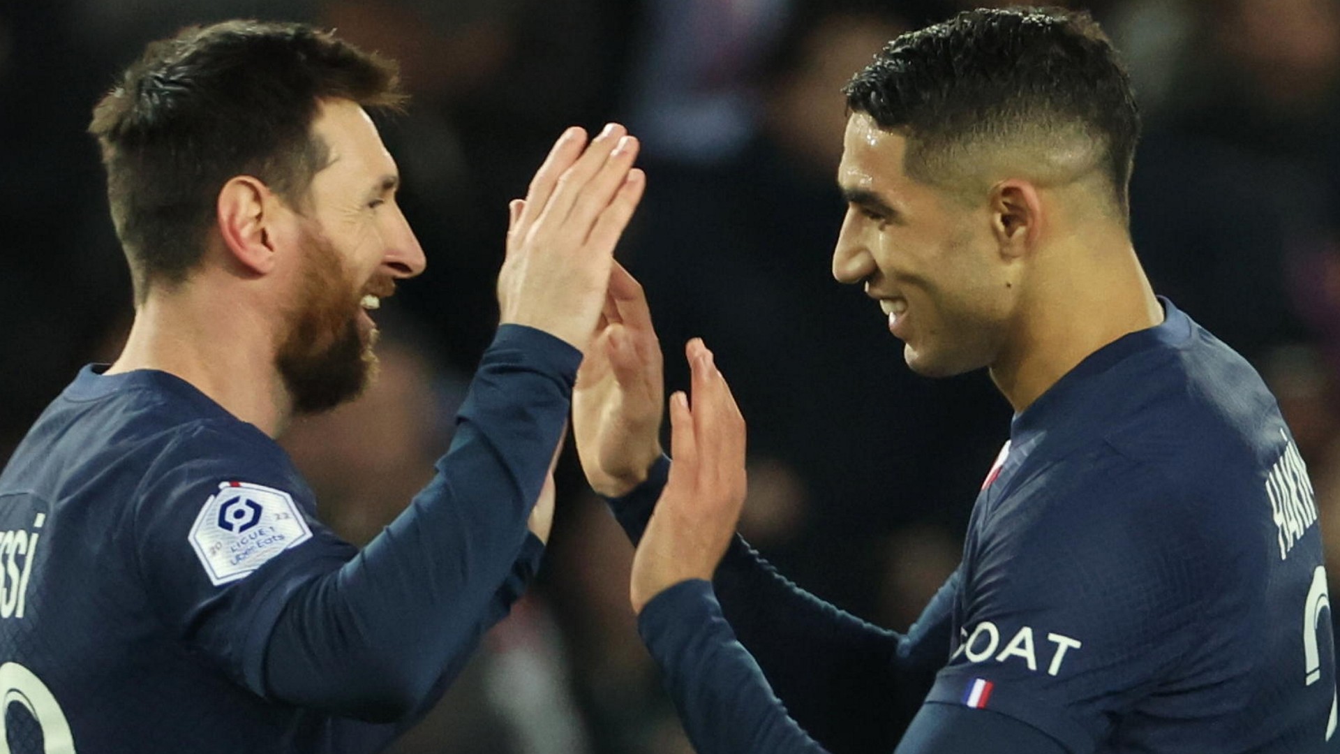 Lionel Messi (left) and Achraf Hakimi gave Paris Saint-Germain victory over Toulouse