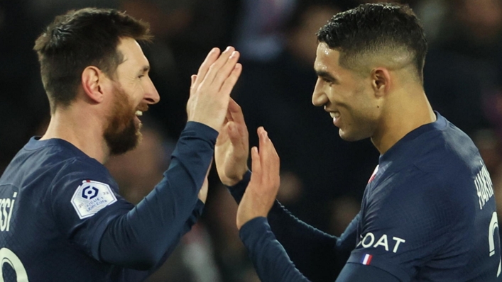 Lionel Messi (left) and Achraf Hakimi gave Paris Saint-Germain victory over Toulouse