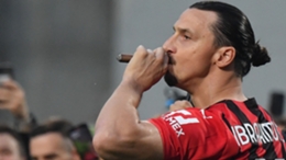 Zlatan Ibrahimovic celebrates Milan's Serie A title triumph with a cigar