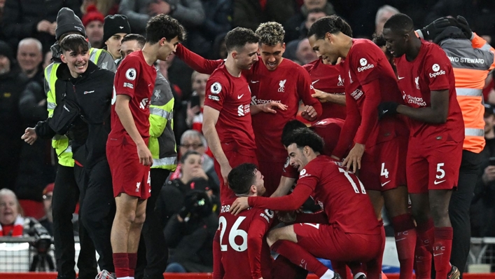 Andy Robertson was knocked over celebrating Liverpool's seventh goal
