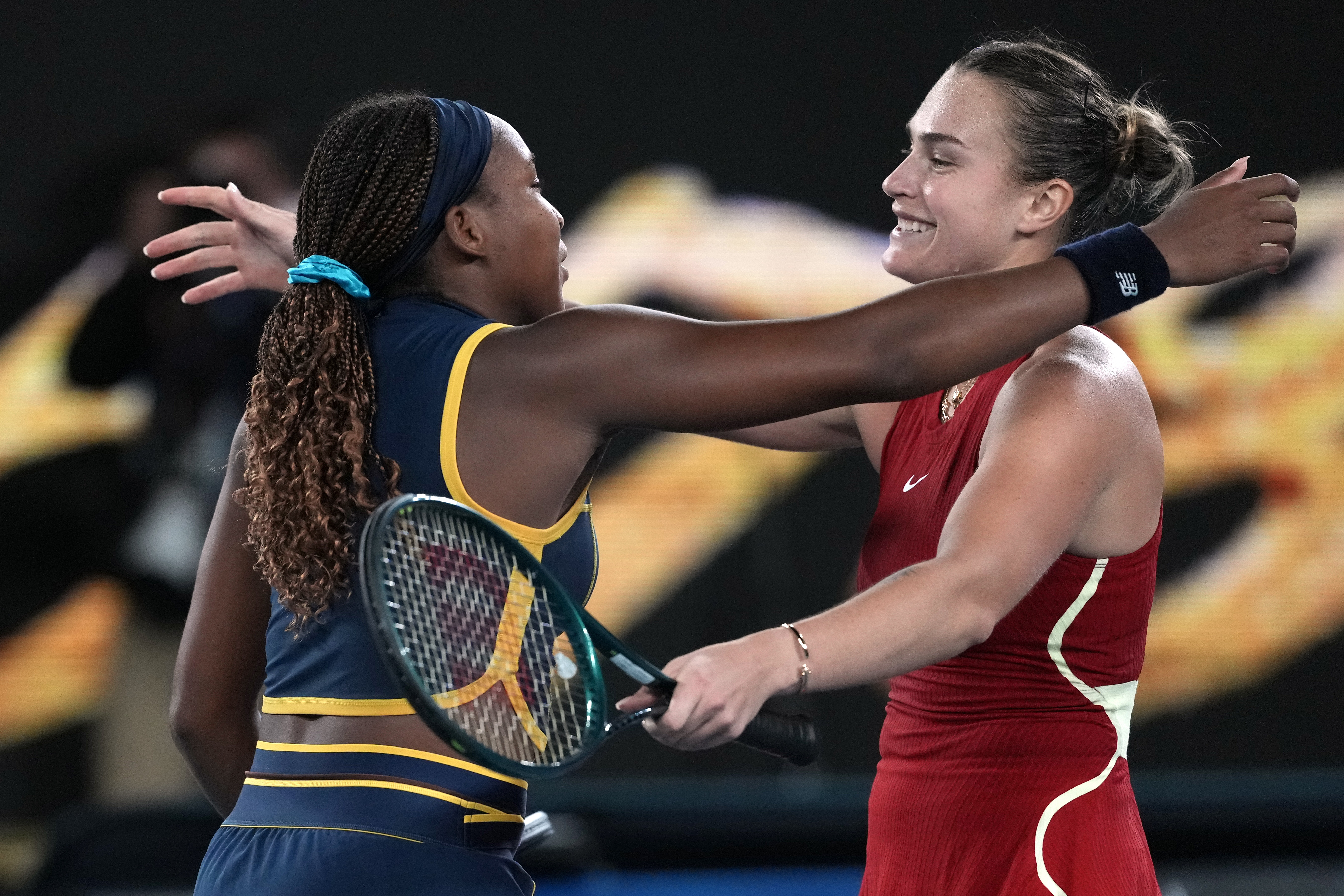 Coco Gauff (left) congratulates Aryna Sabalenka