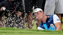 Viktor Hovland hits from a bunker on the second hole during the final round of the Tour Championship (John Bazemore/AP)