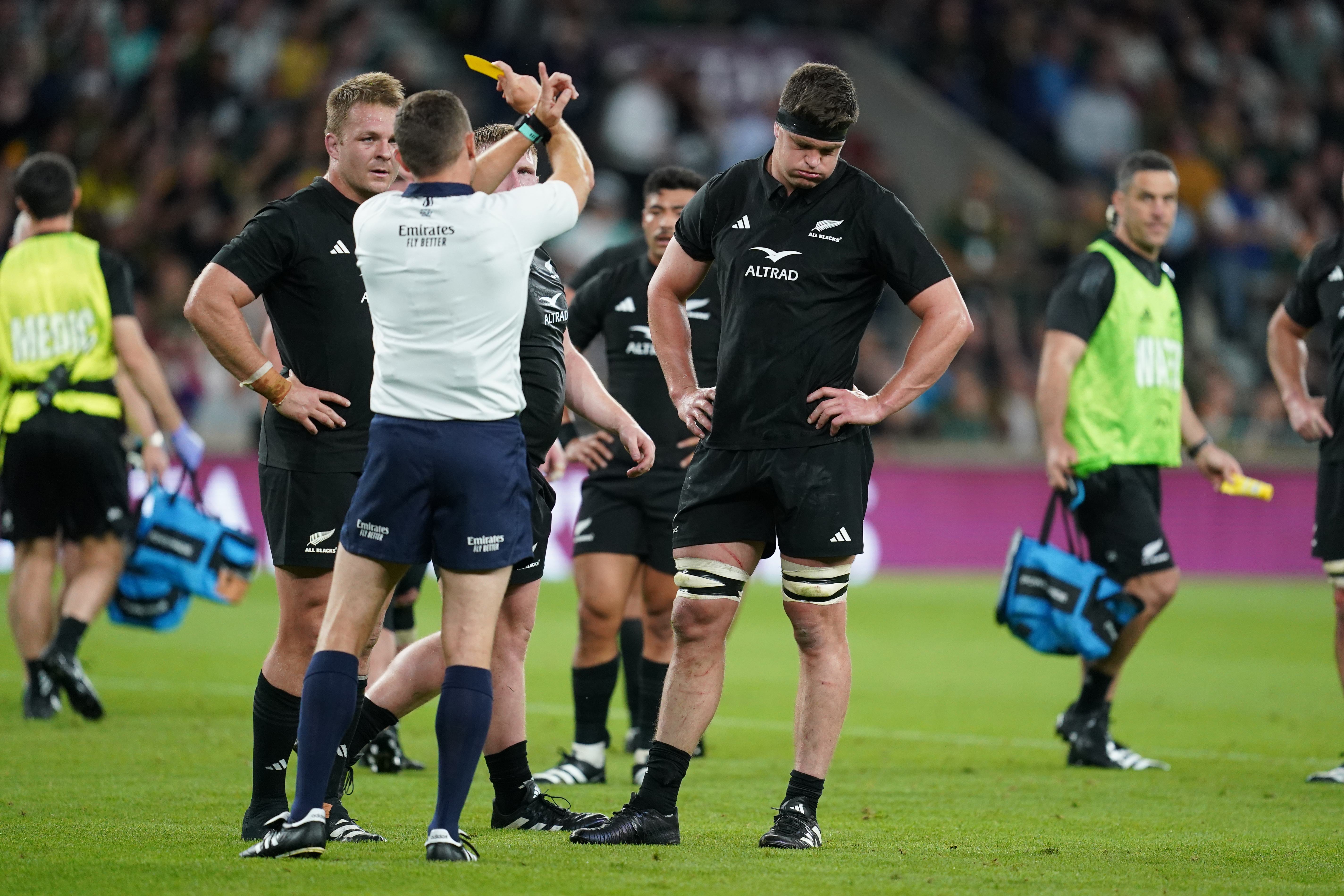 Scott Barrett (right) is shown a second yellow card