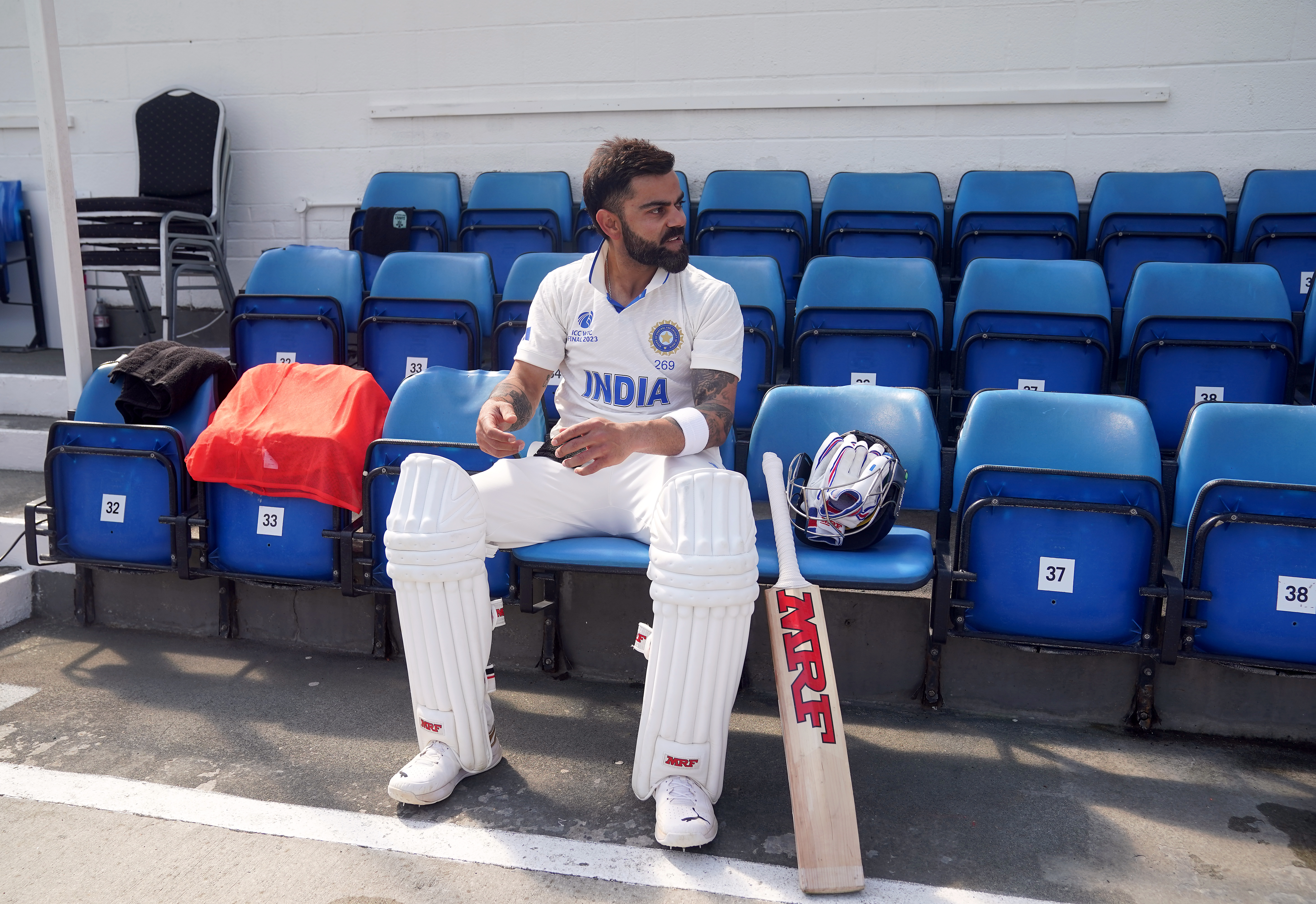 India's Virat Kohli prepares to head out to bat