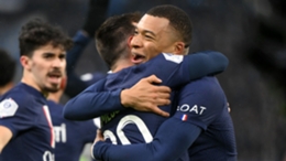 Kylian Mbappe and Lionel Messi celebrate at the Stade Velodrome