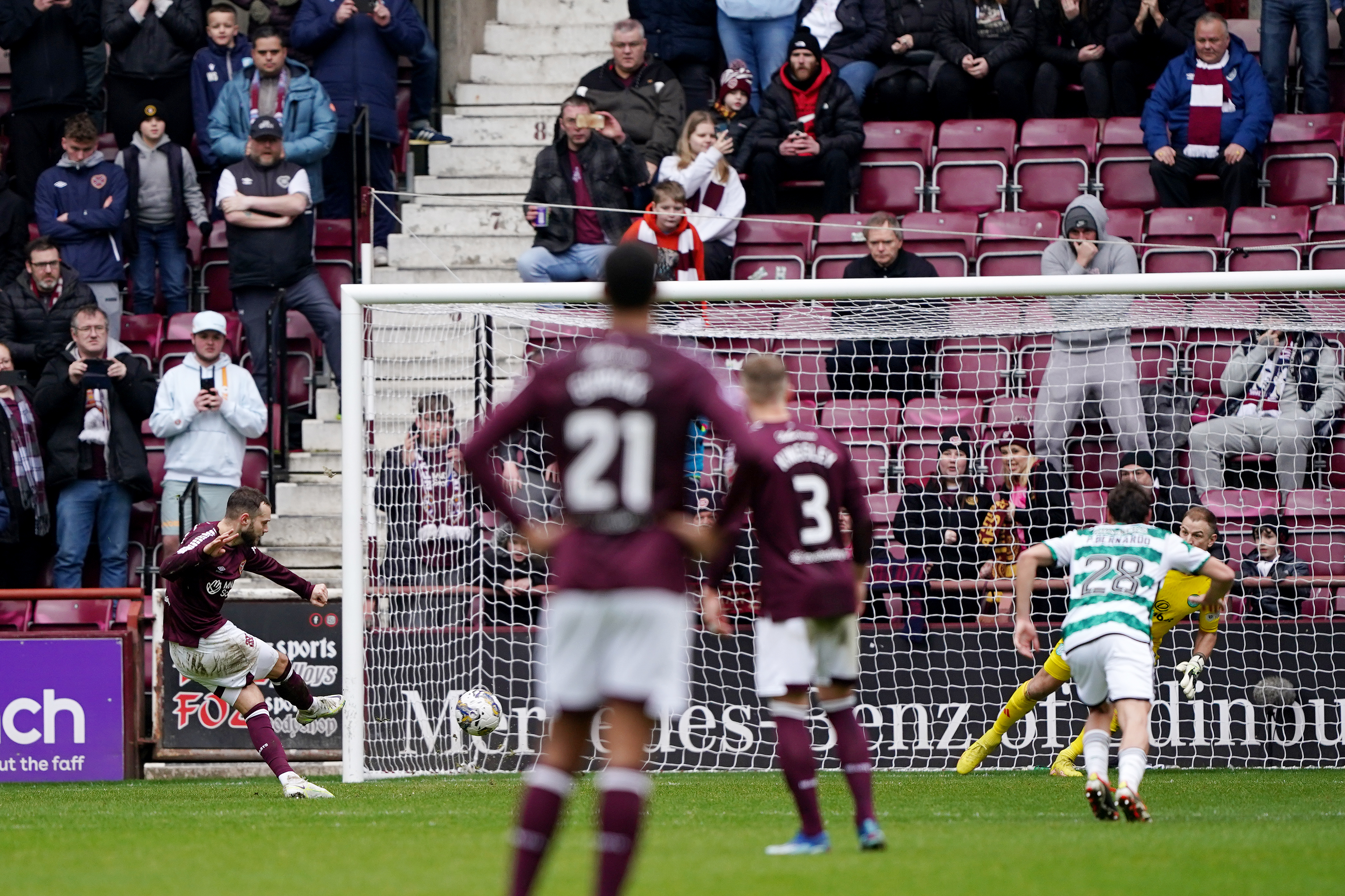 Jorge Grant (left) put Hearts ahead from the spot
