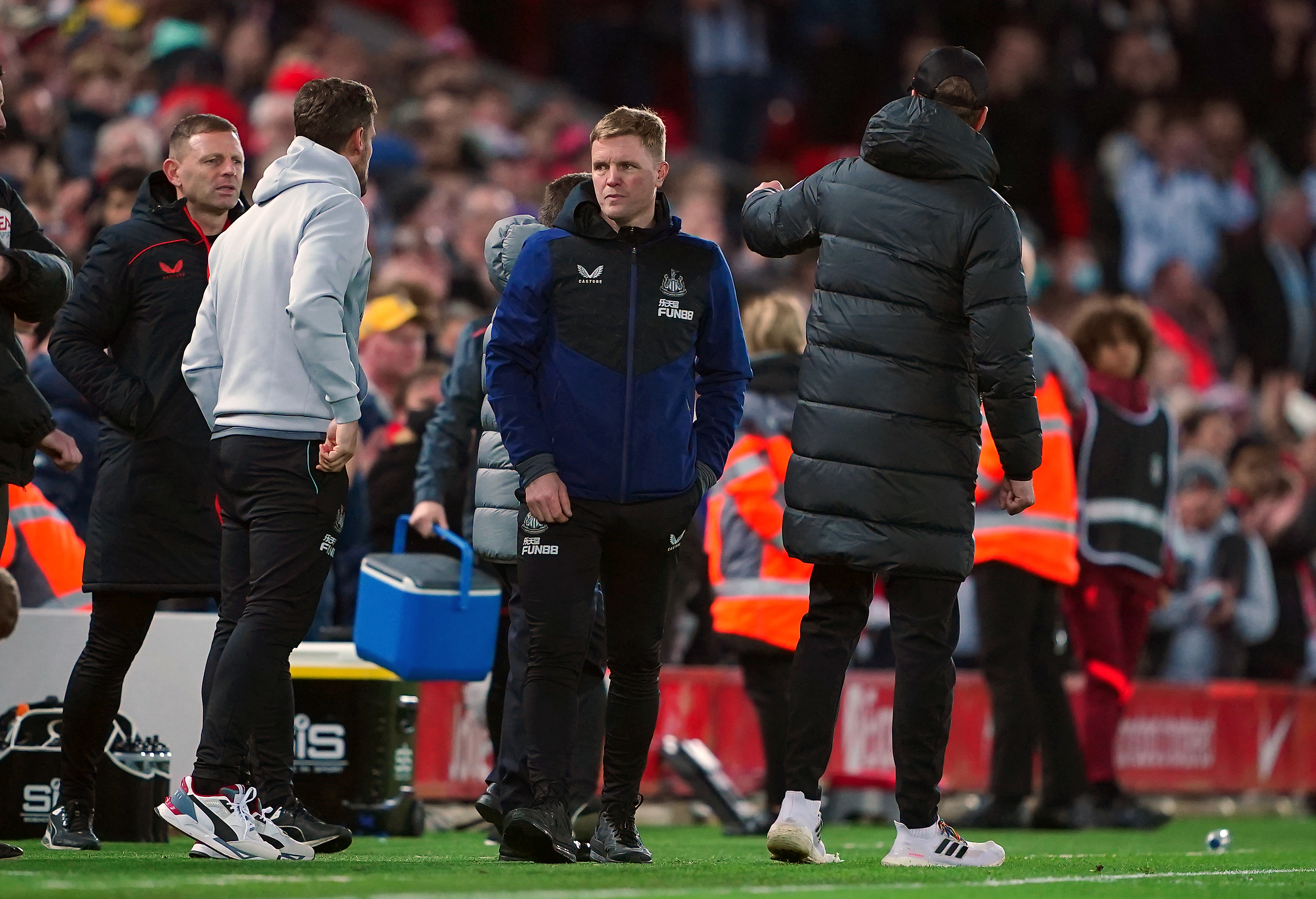 Newcastle boss Eddie Howe and Liverpool manager Jurgen Klopp (right) have had differences of opinion on the sideline