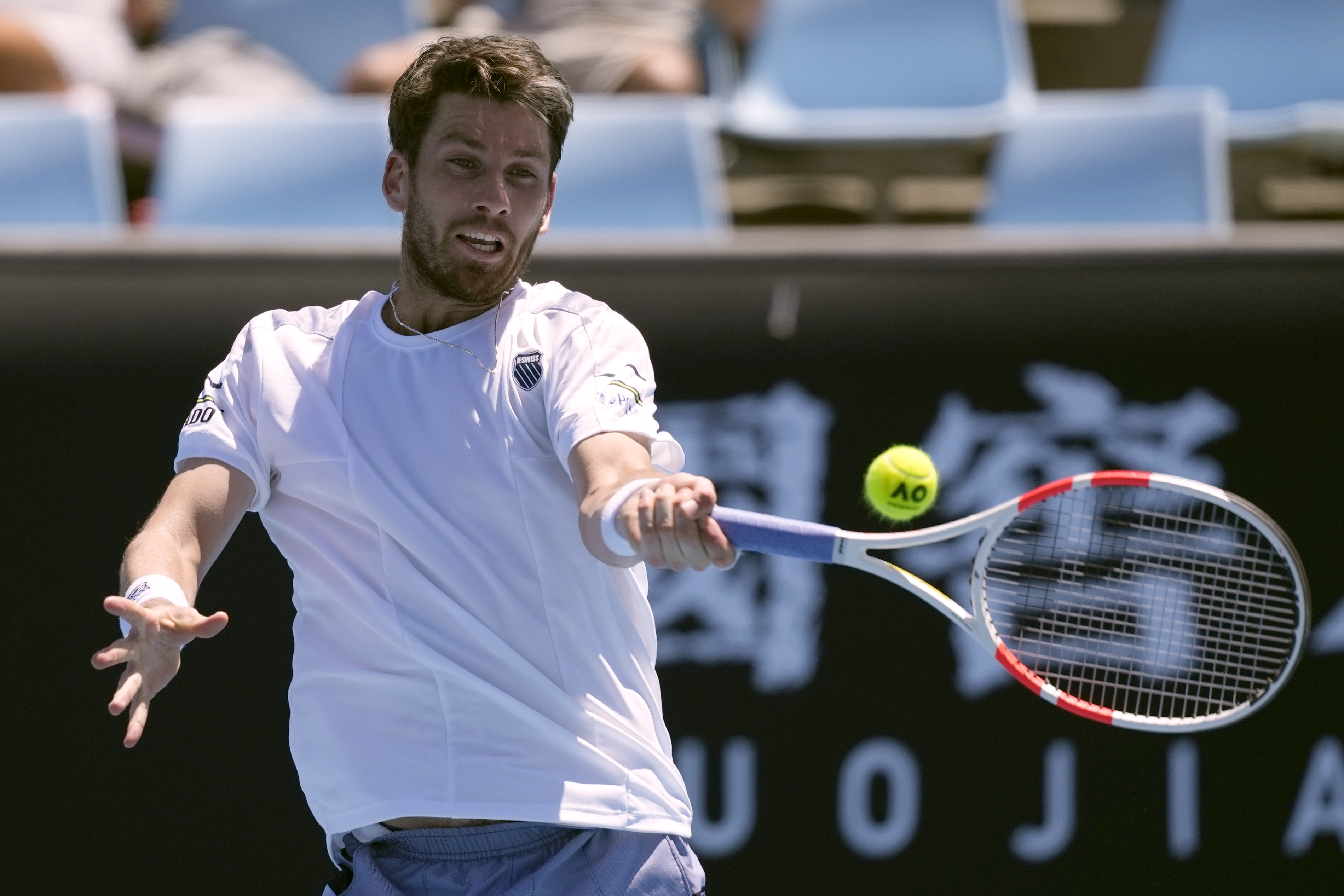 Cameron Norrie hits a forehand