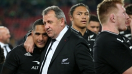 Ian Foster celebrates with Aaron Smith (L) after New Zealand beat South Africa