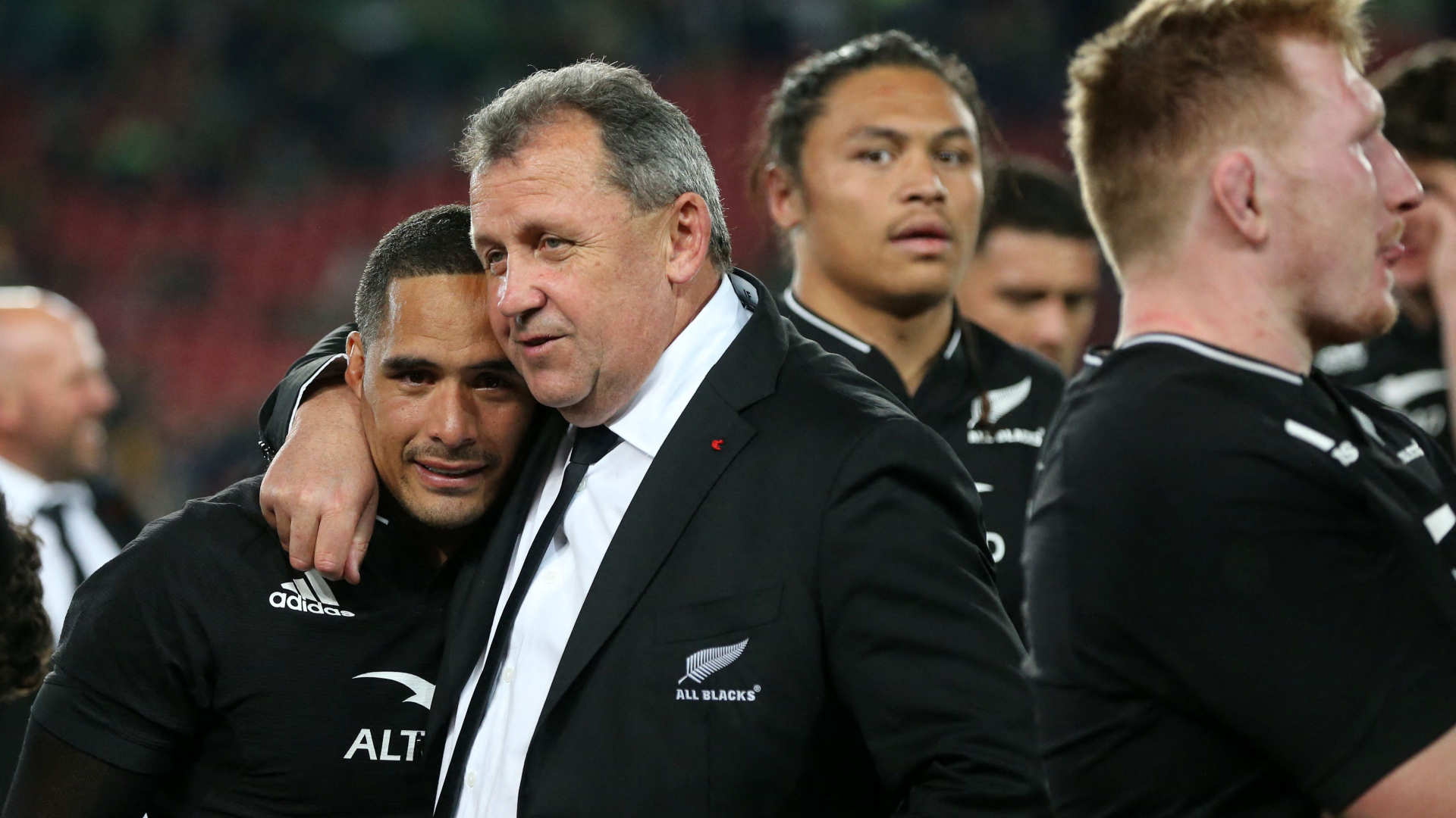 Ian Foster celebrates with Aaron Smith (L) after New Zealand beat South Africa