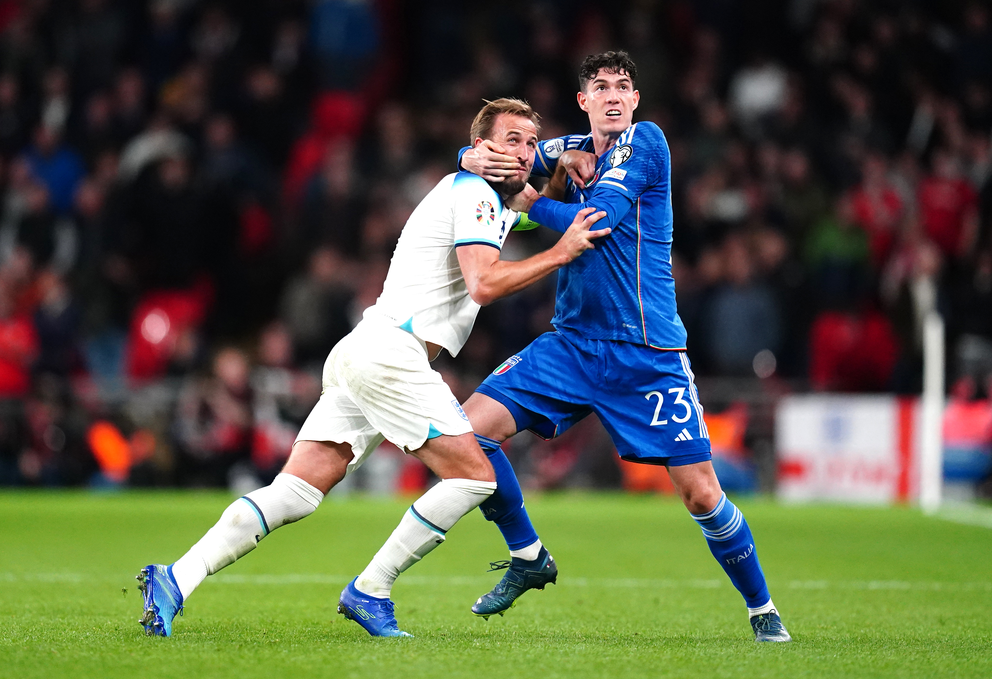 Alessandro Bastoni (right) in action for Italy