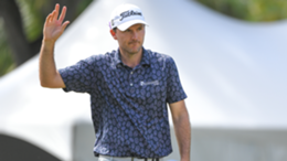 Russell Henley waves on the ninth green during the second round of the Sony Open in Hawaii at Waialae Country Club