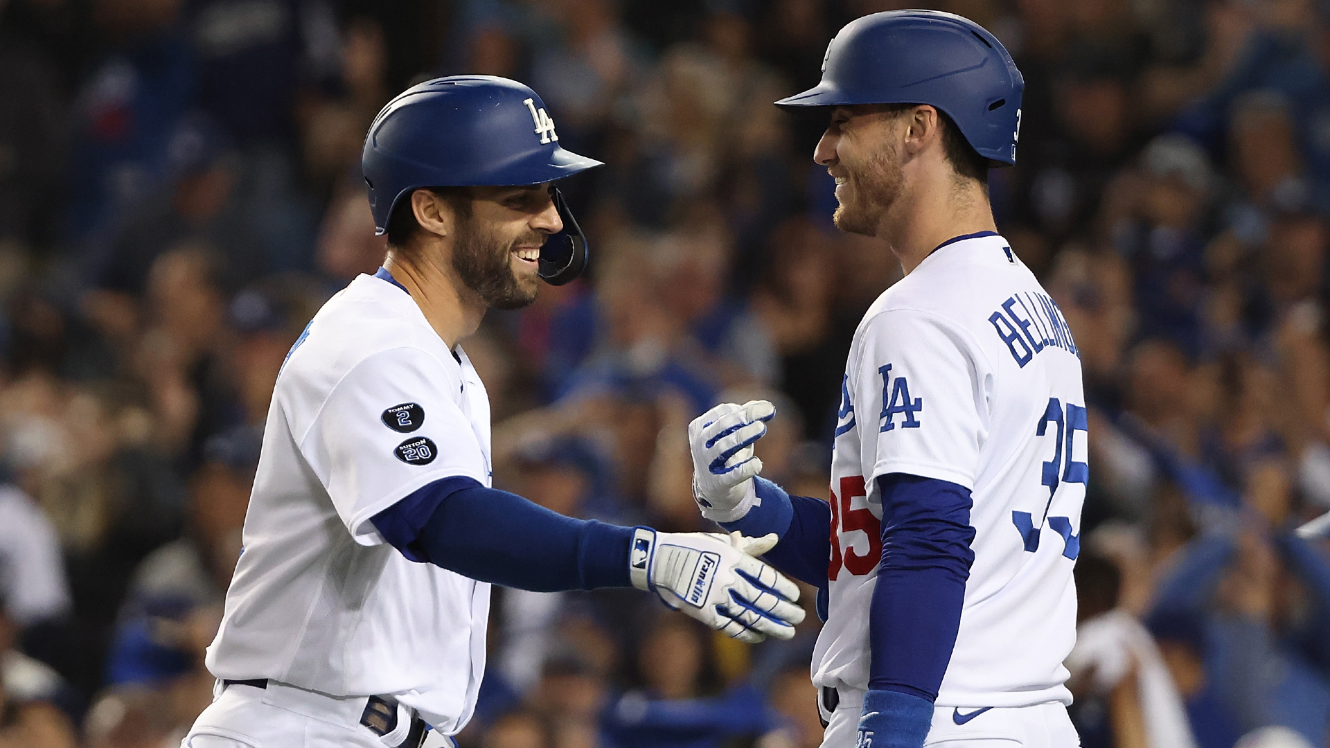Chris Taylor #3 of the Los Angeles Dodgers is congratulated by Cody Bellinger #35 following a solo home run during the seventh inning of Game Five of the National League Championship Series against the Atlanta Braves
