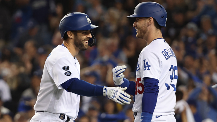Chris Taylor #3 of the Los Angeles Dodgers is congratulated by Cody Bellinger #35 following a solo home run during the seventh inning of Game Five of the National League Championship Series against the Atlanta Braves
