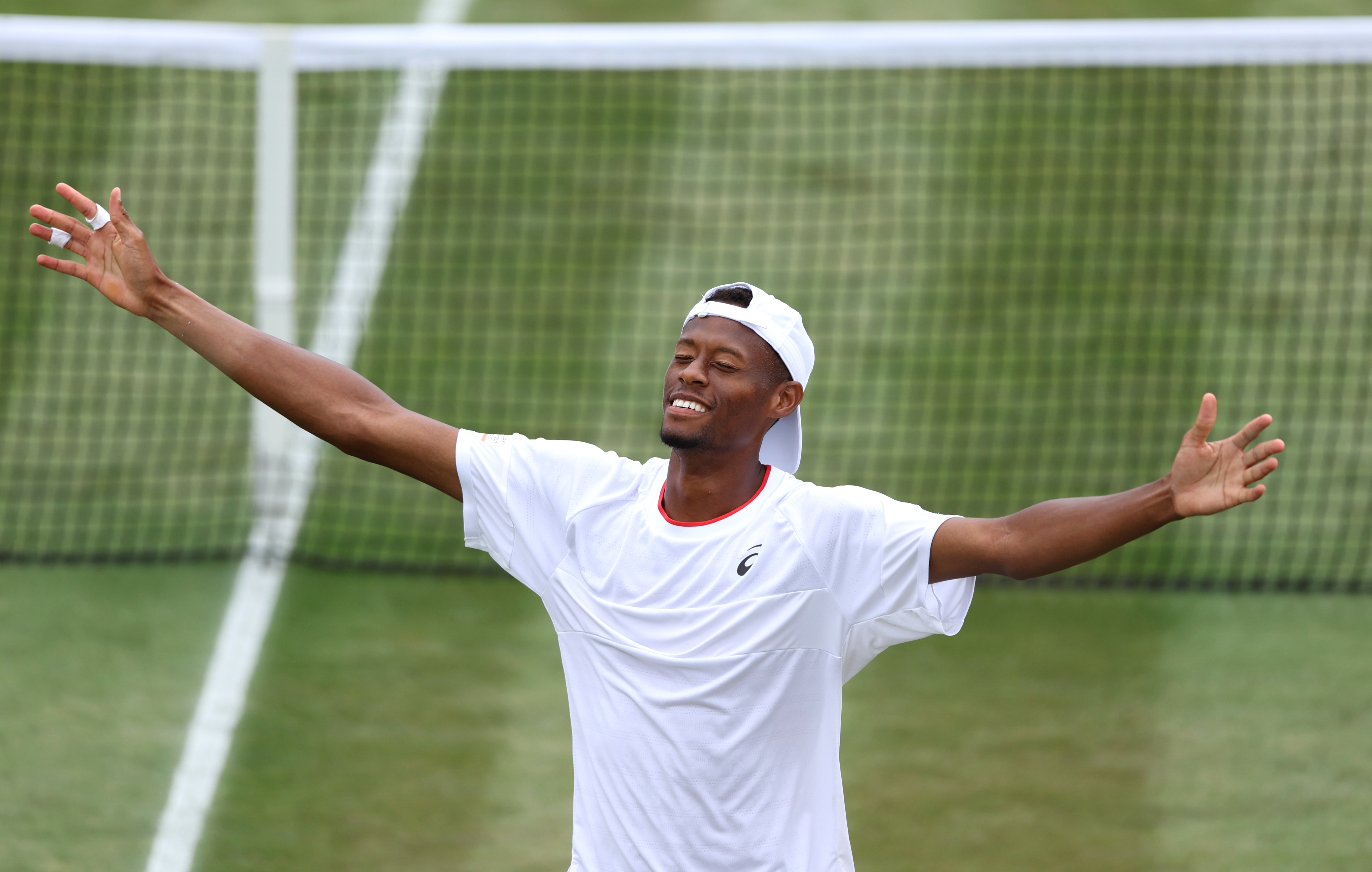Chris Eubanks celebrates his victory over fifth seed Stefanos Tsitsipas
