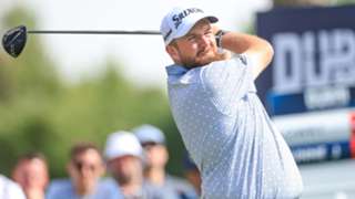 Lowry holding onto positive attitude after taking Dubai Invitational lead from McIlroy