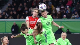 Arsenal's Vivianne Miedema and Wolfsburg's German forward Alexandra Popp battle for the ball