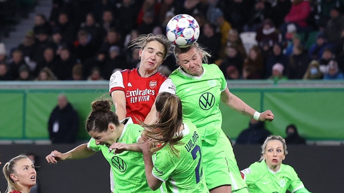 Arsenal's Vivianne Miedema and Wolfsburg's German forward Alexandra Popp battle for the ball