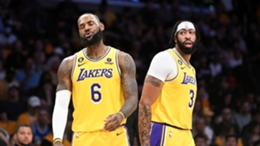Lakers stars LeBron James (L) and Anthony Davis (R) will be absent for the game with the Raptors
