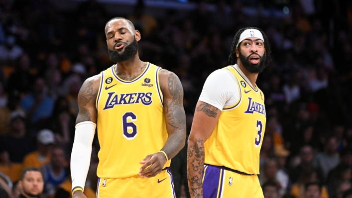 Lakers stars LeBron James (L) and Anthony Davis (R) will be absent for the game with the Raptors