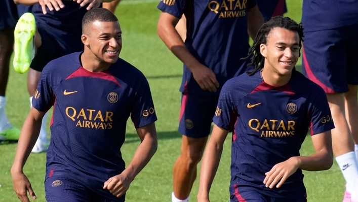 Kylian Mbappe, left, and his brother Ethan in training with Paris St Germain (Christophe Ena/AP)