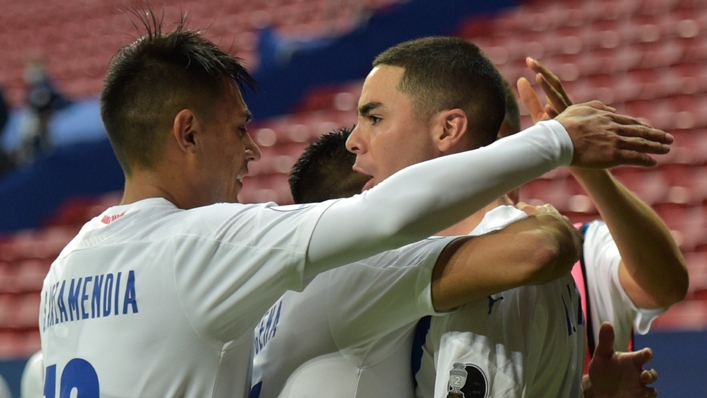 Miguel Almiron and Paraguay celebrate against Chile