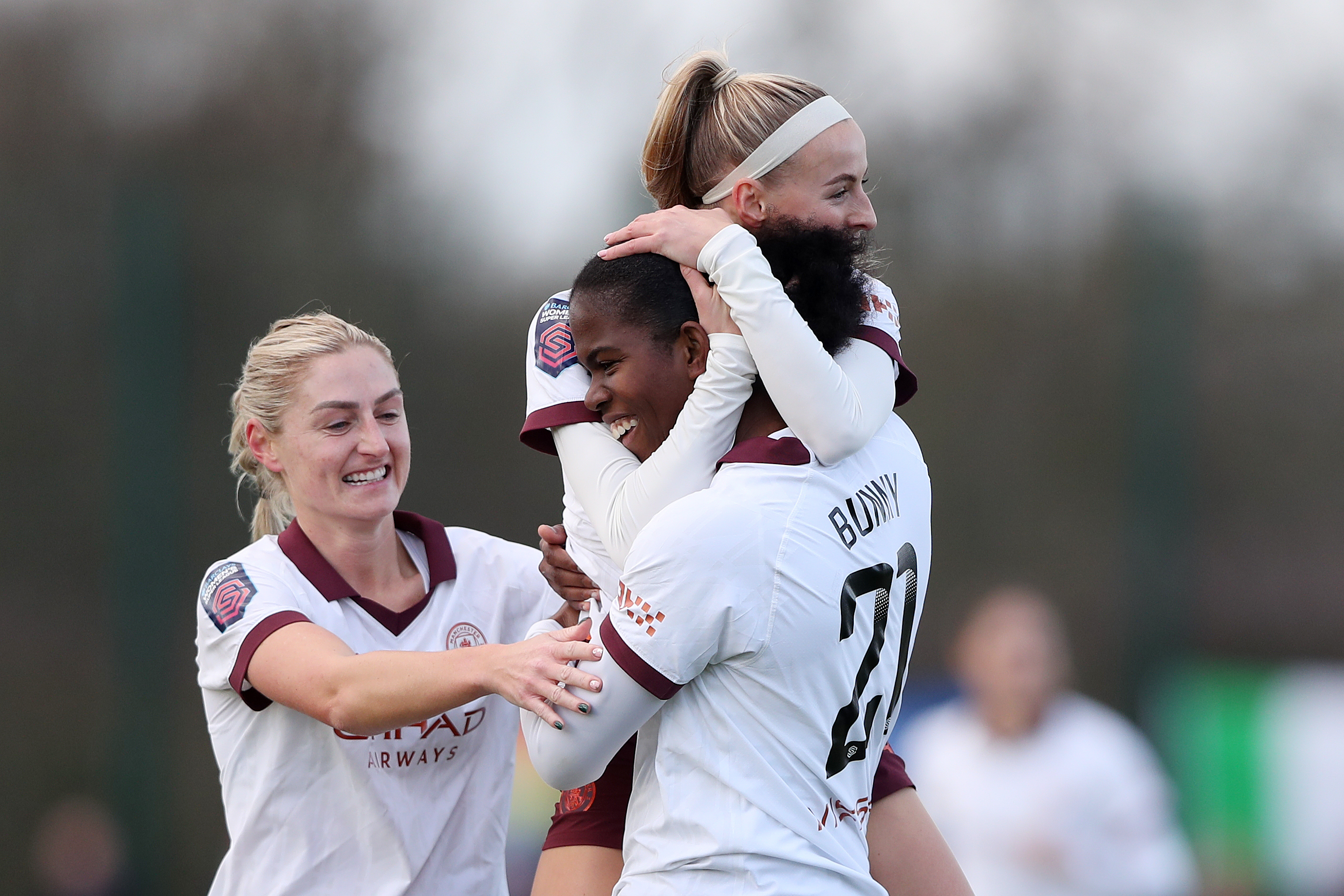 Khadija Shaw (bottom right) celebrates scoring in Manchester City's 4-1 win over Everton, in which she notched a hat-trick (Tim Markland/PA)