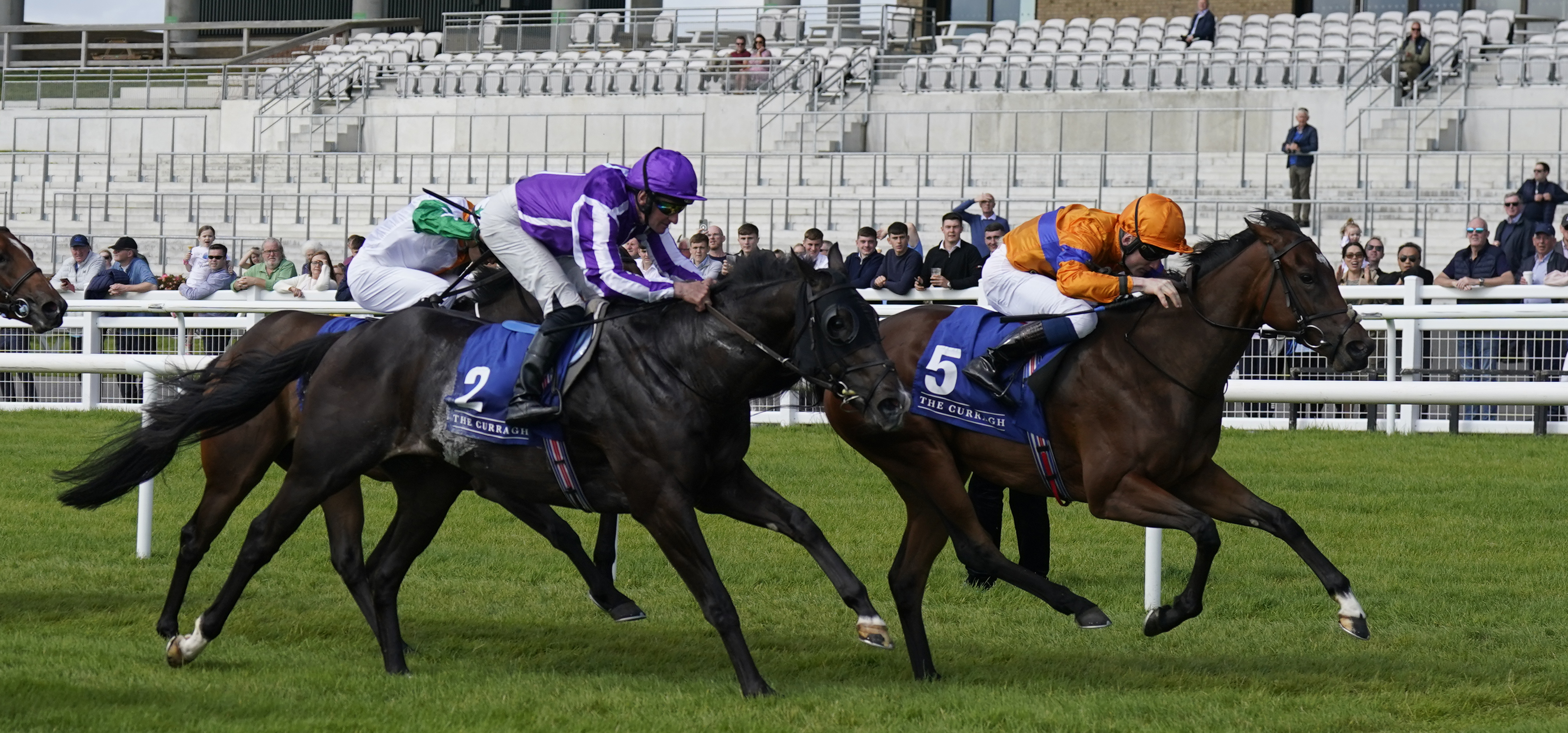 Asean (right) winning at the Curragh