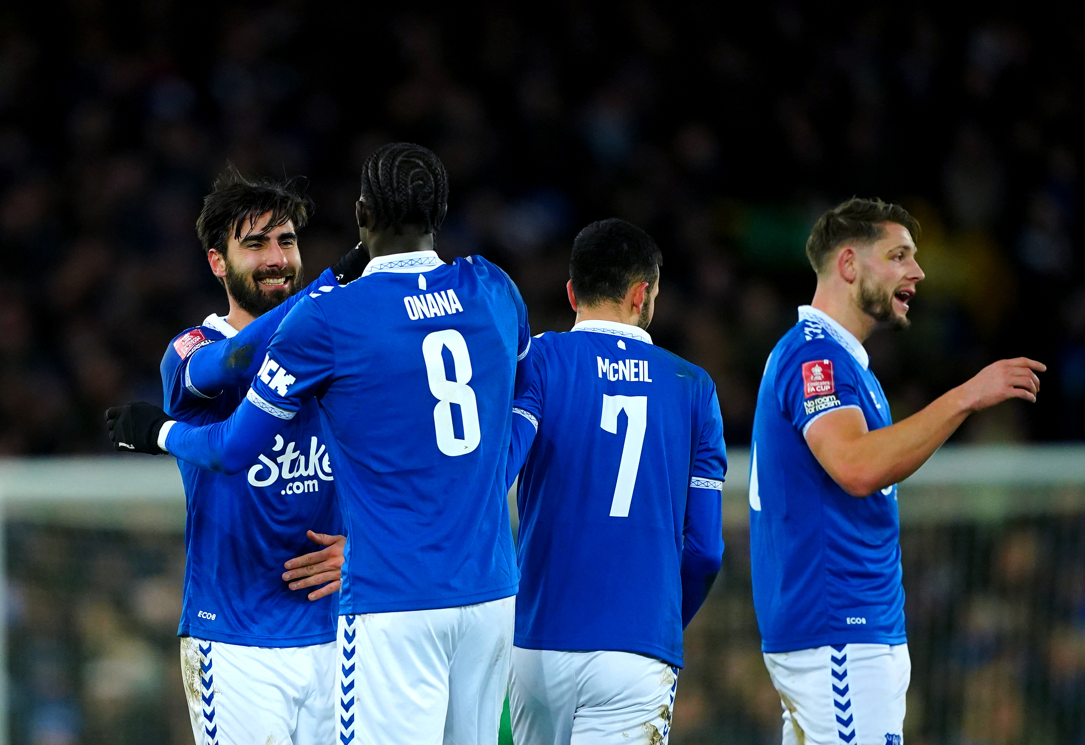 Andre Gomes, left, celebrates his goal