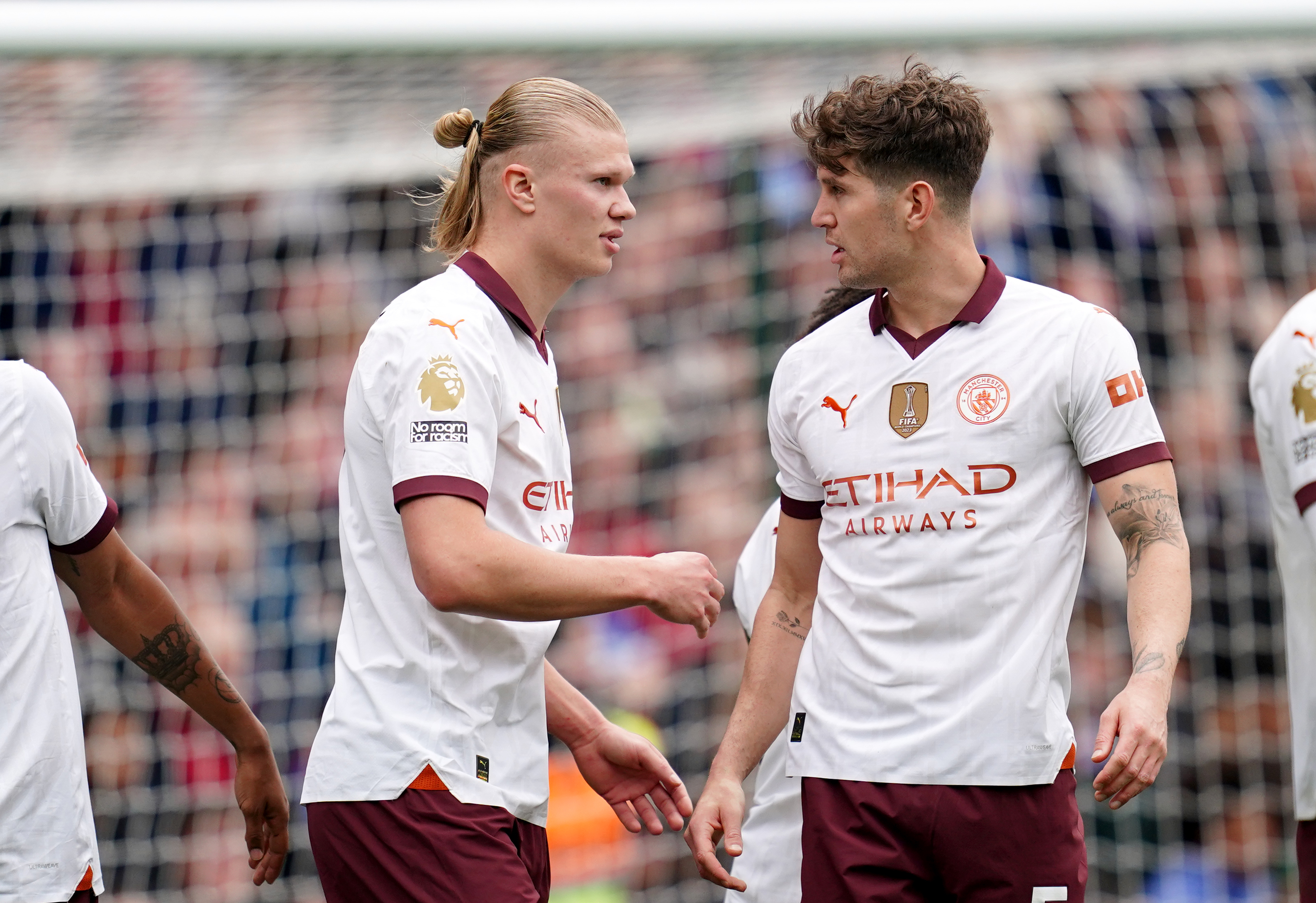 Erling Haaland, left, celebrates after scoring City's third goal
