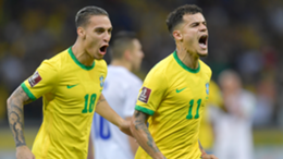 Philippe Coutinho (right) of Brazil celebrates after scoring the second goal of his team during a match between Brazil and Paraguay