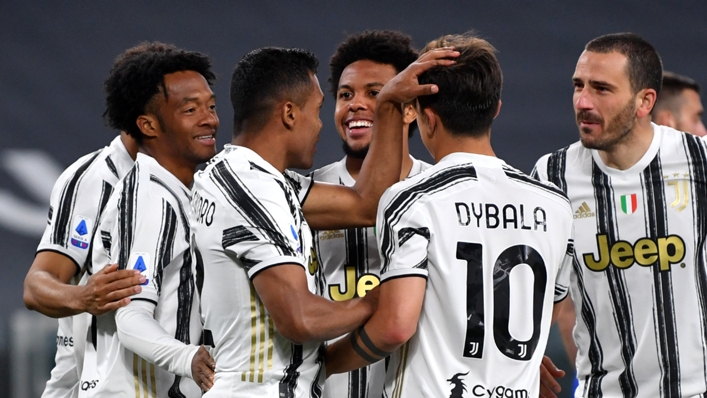 Alex Sandro is congratulated by his Juventus team-mates