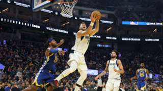 Doncic's triple-double sparks Mavs in win over Warriors