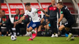 USA's Christian Pulisic (L) in action against Canada
