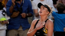 Elina Svitolina looks emotional after beating Daria Kasatkina (Christophe Ena/AP)