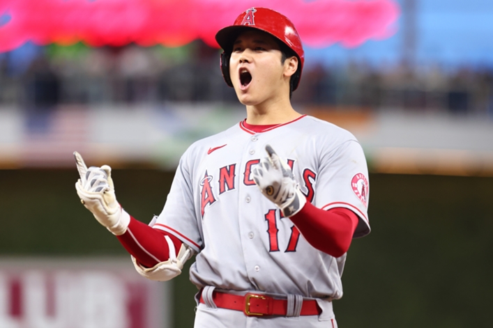 Shohei Ohtani celebrates his two-run hit in a game where he also struck out 10 batters