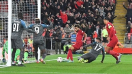Mohamed Salah (centre) scores from close range for Liverpool