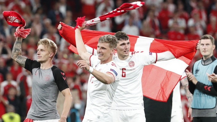Denmark players celebrate their stunning win over Russia