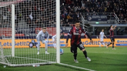 Nicola Sansone celebrates after Ionut Radu's error hands Bologna victory over Inter