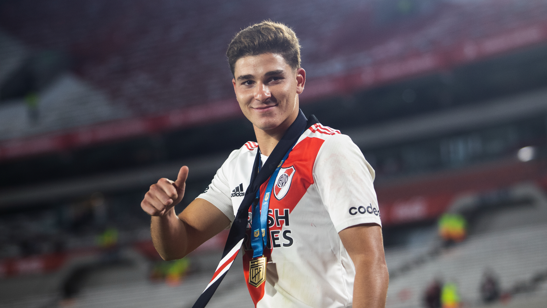 Julian Alvarez celebrates River Plate's league triumph