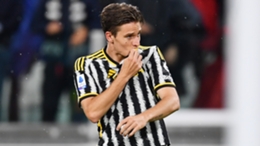 Nicolo Fagioli kisses the Juventus badge after scoring against Cremonese