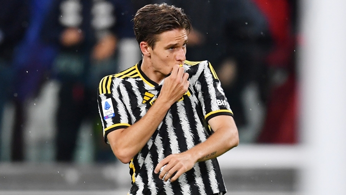 Nicolo Fagioli kisses the Juventus badge after scoring against Cremonese